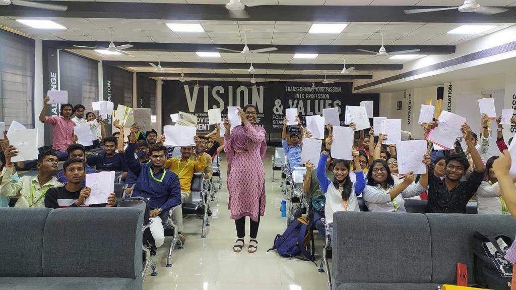 Participants holding up placards during an training