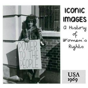 The image shows Marsha Johnson holding a placard that says - "Power to the People"