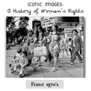 The image shows women marching in France and demonstrating for the right to abort. 